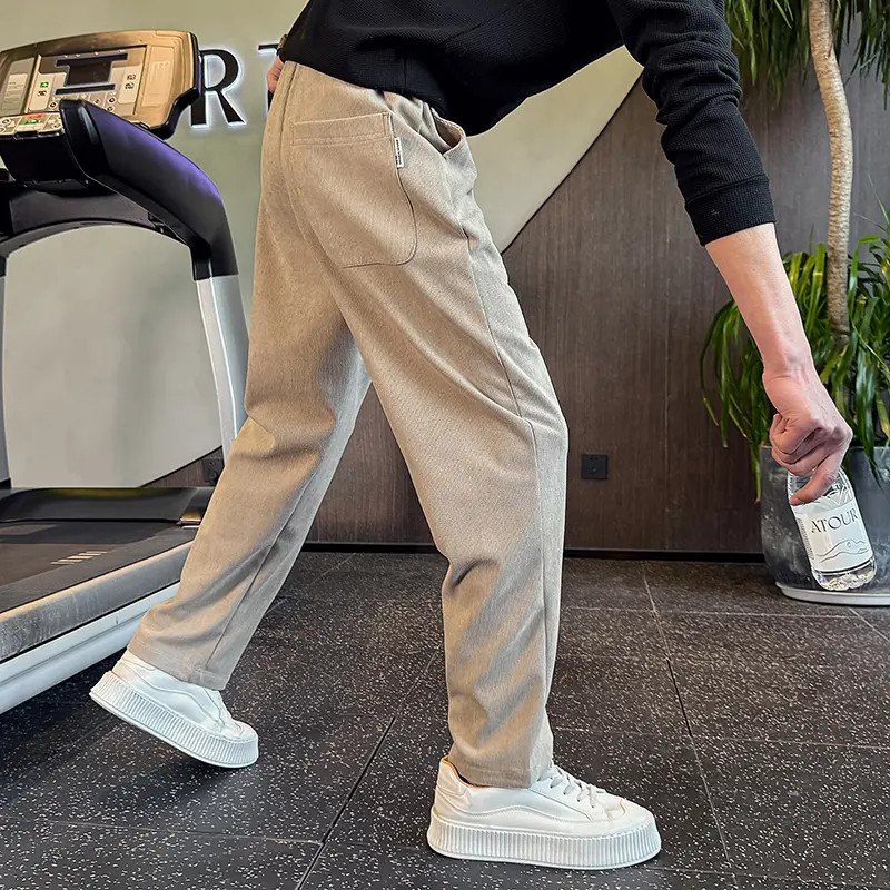 灰色休闲裤秋季裤子男款爆款2025新款宽松直筒运动卫裤男生弯刀裤