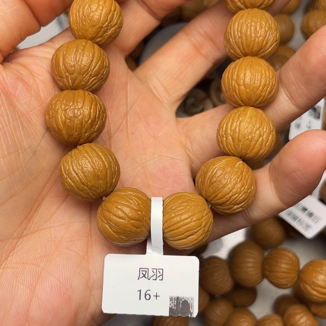 .***.吊坠猴头核桃凤羽