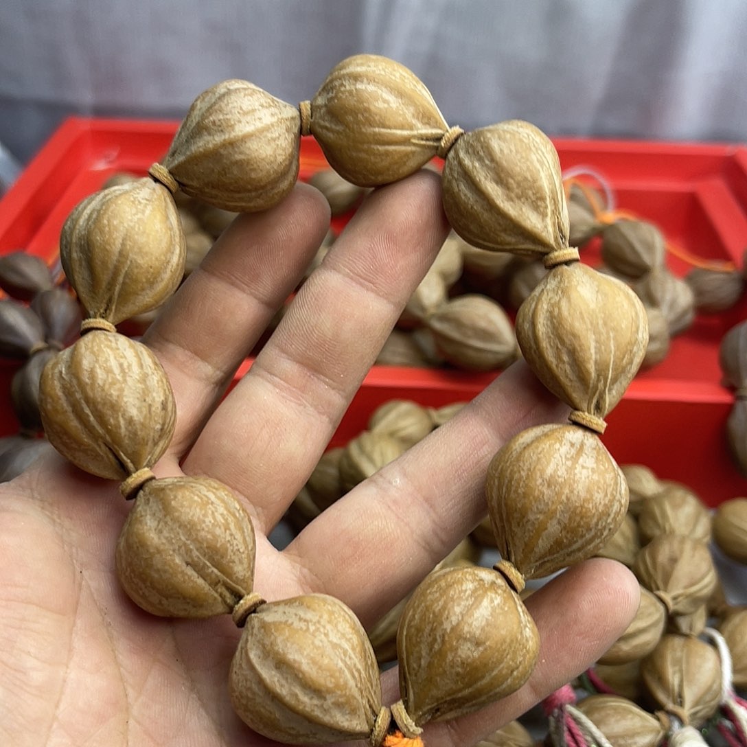 大***年橄榄核手串24矮桩爆肉