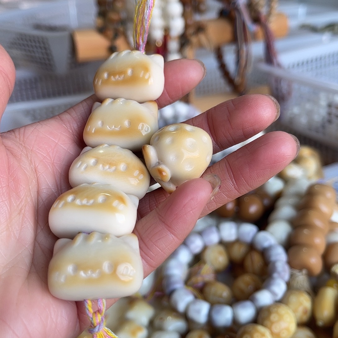 柠***酥菩提根/象牙果手串猫猫头6颗
