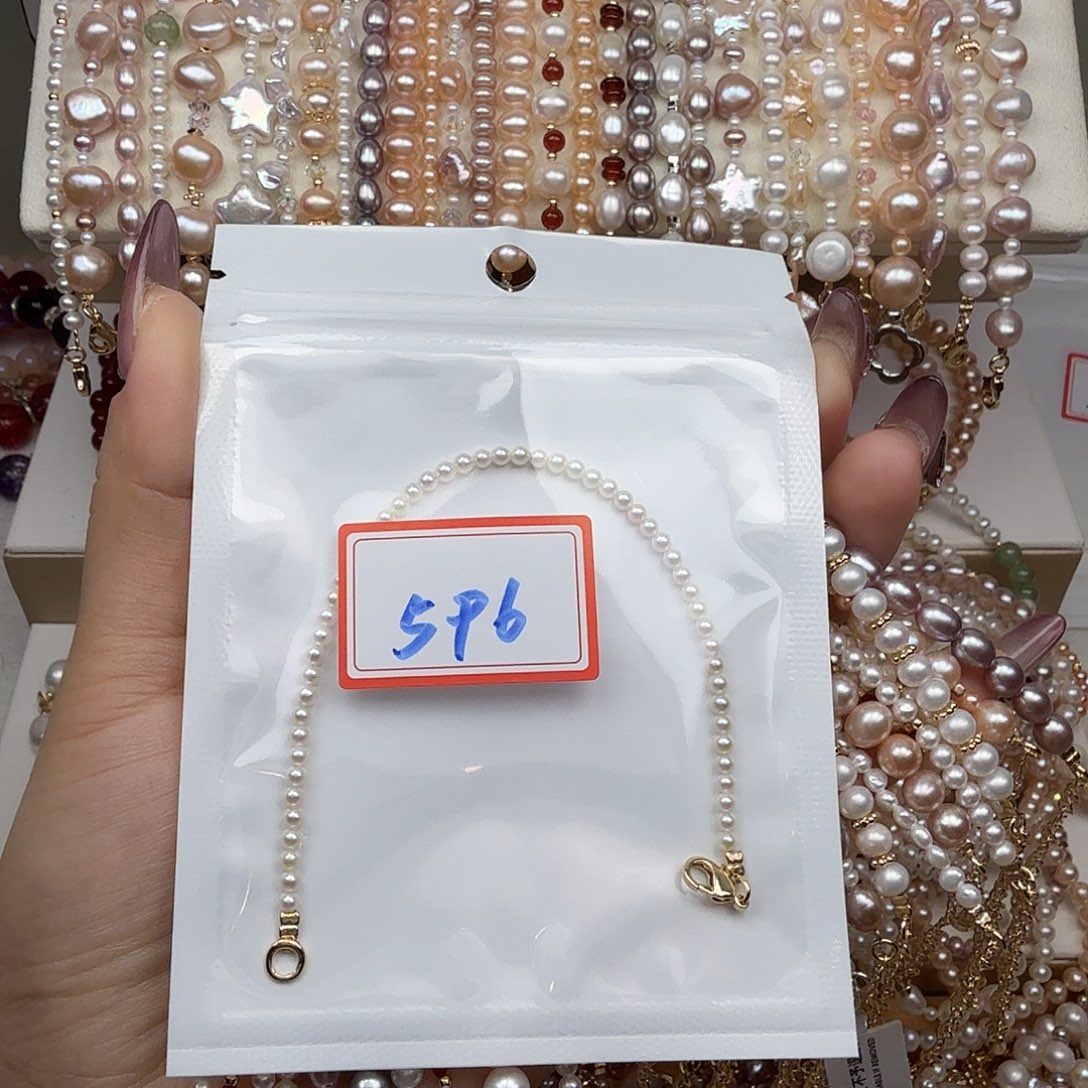 黄***u淡水珍珠钛钢手绳