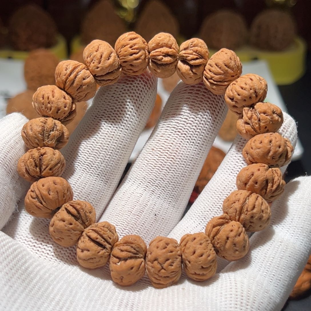 文玩核桃把件李*·蟠桃核铁豆豆