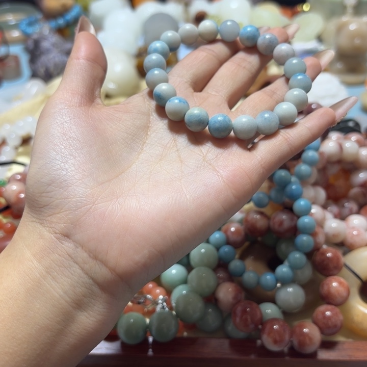 雪***儿石英岩玉合金手链