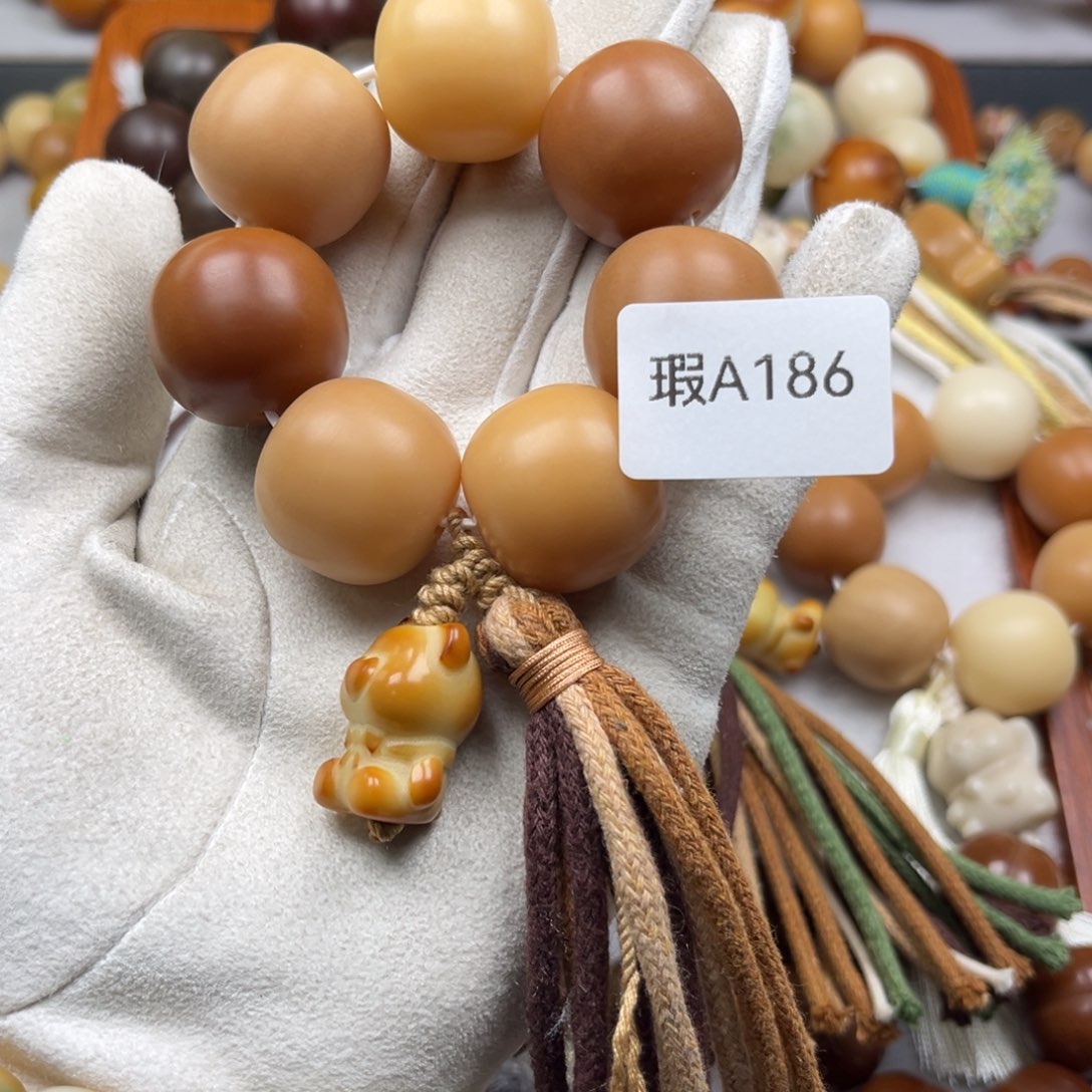 菩提根/象牙果吊坠M****?瑕A186桶珠手捻24mm一串