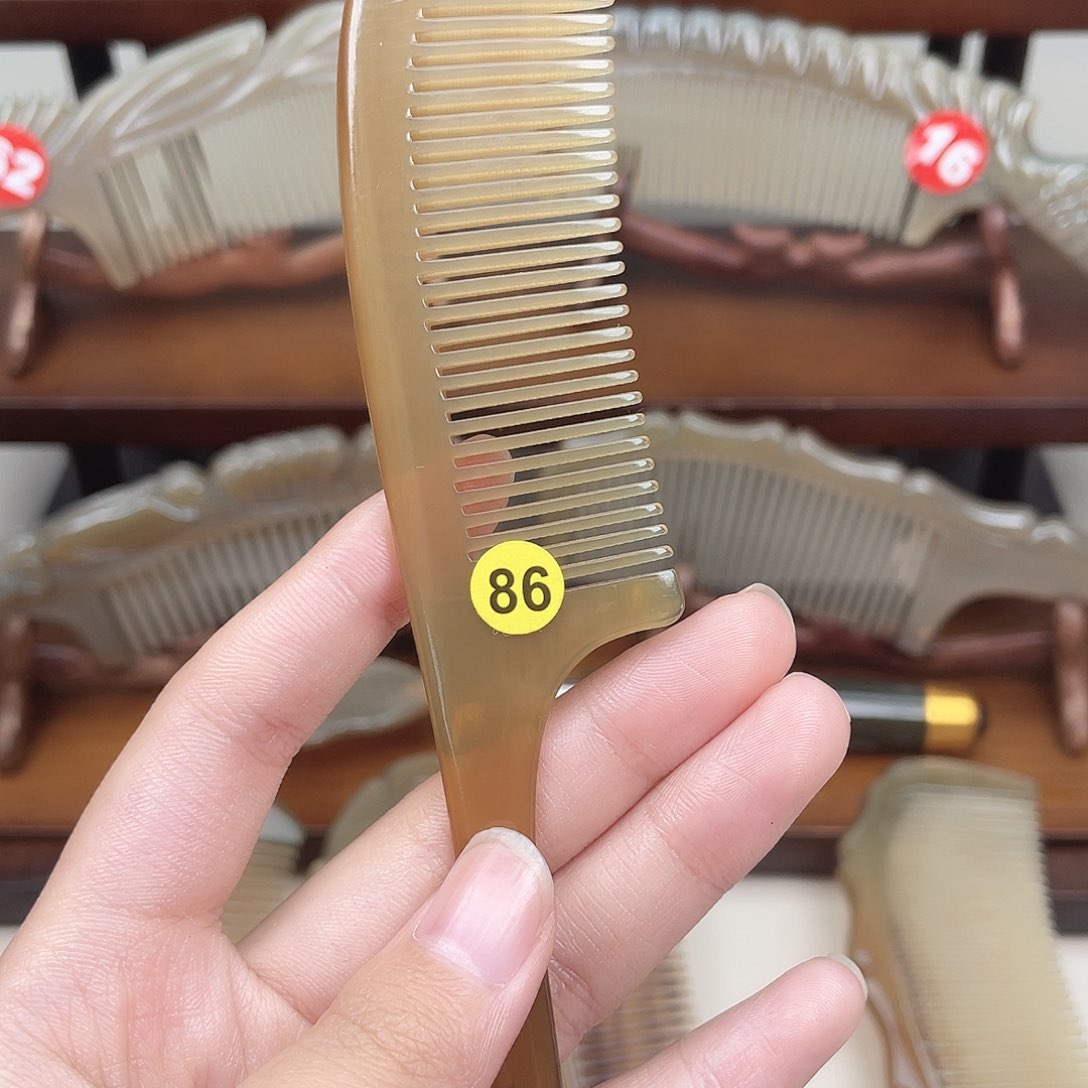 纯手工制作的牛角梳86燕*