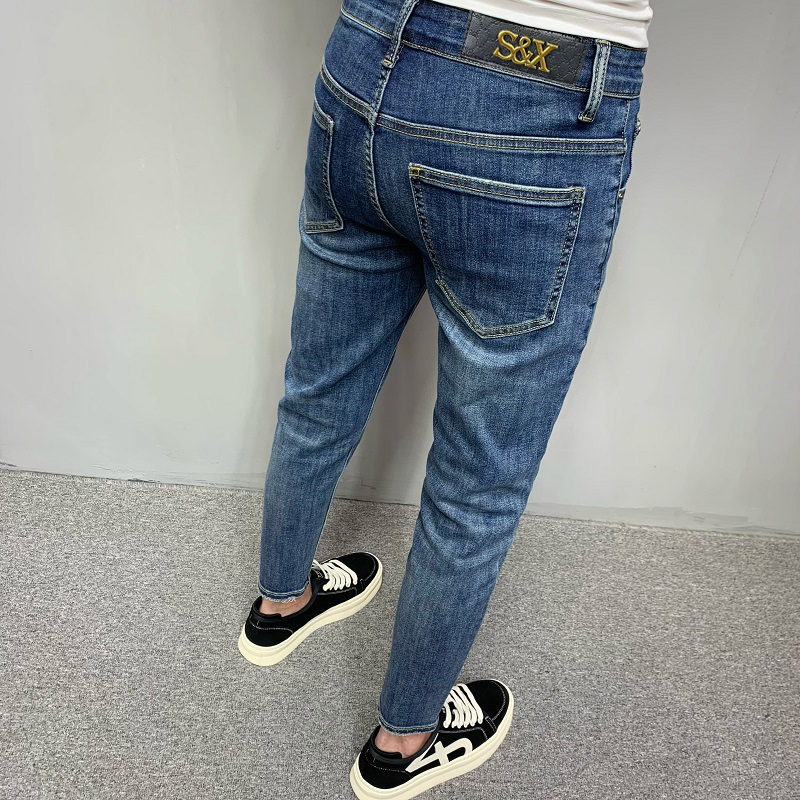 修身牛仔裤男秋冬新款高端轻奢潮牌水洗蓝色休闲弹力小脚九分裤子