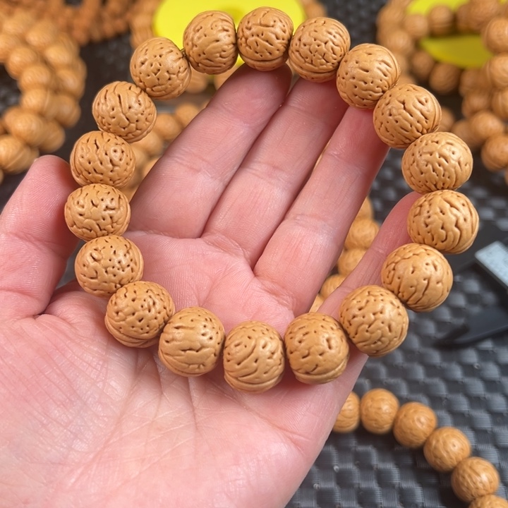 相***畔手串桃核金丹桃核