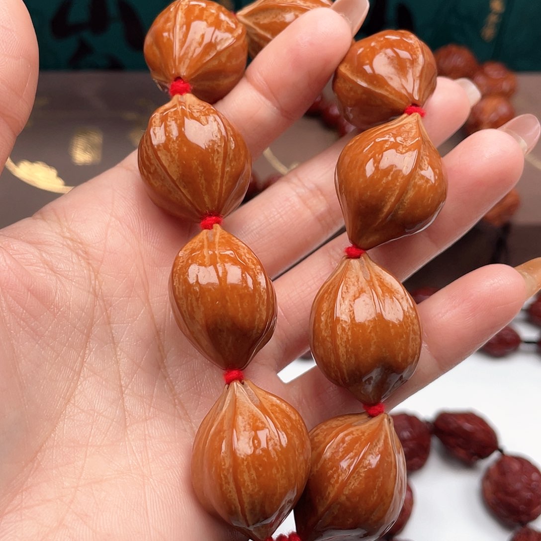 橄榄核手串王*电素核手串