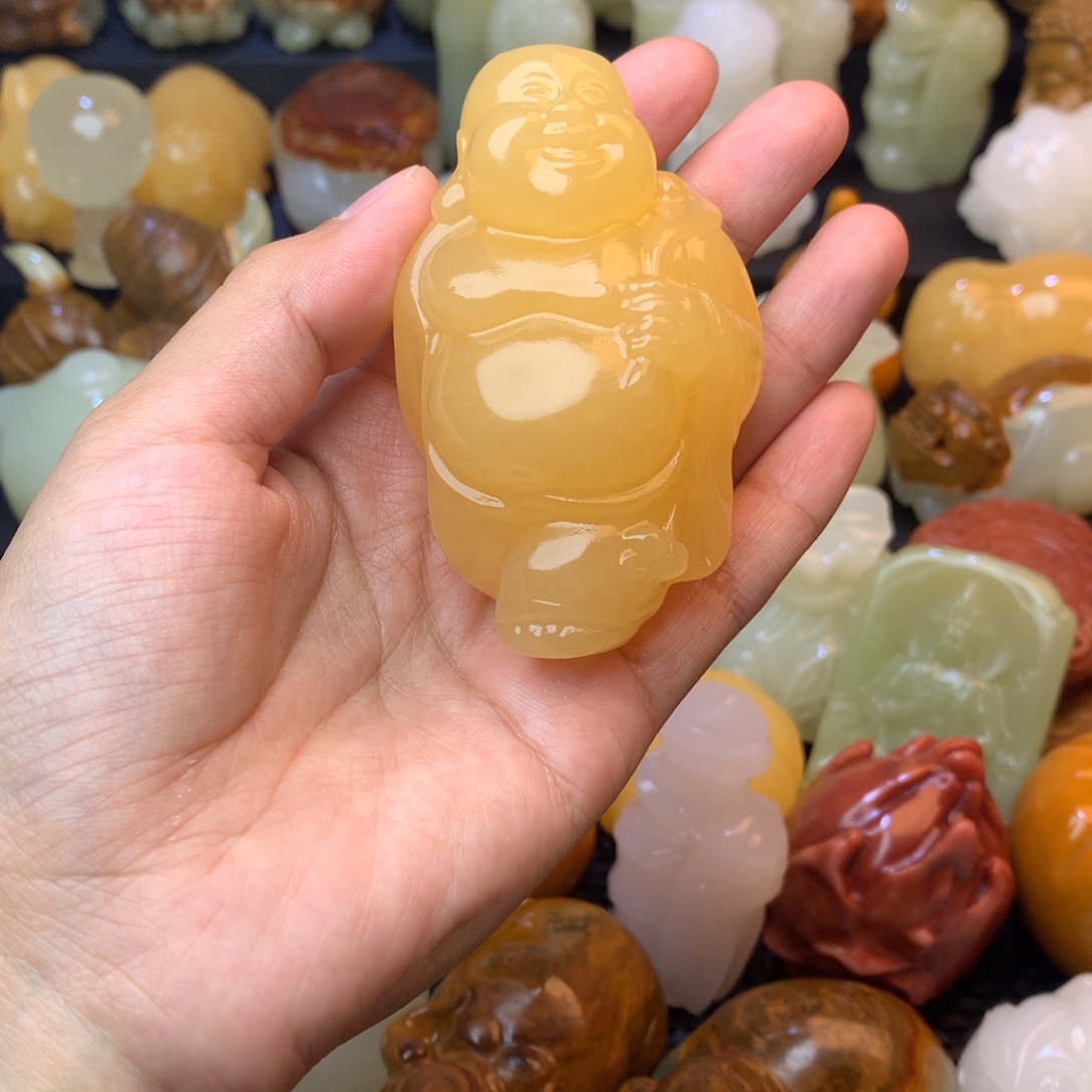 澂***澂五彩石手把件黄色笑佛