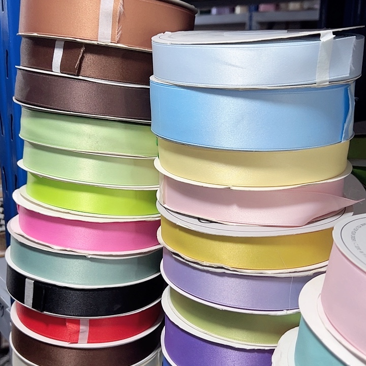 0.6的亮光棉带浅浅蓝浅韩粉浅紫大红各50码