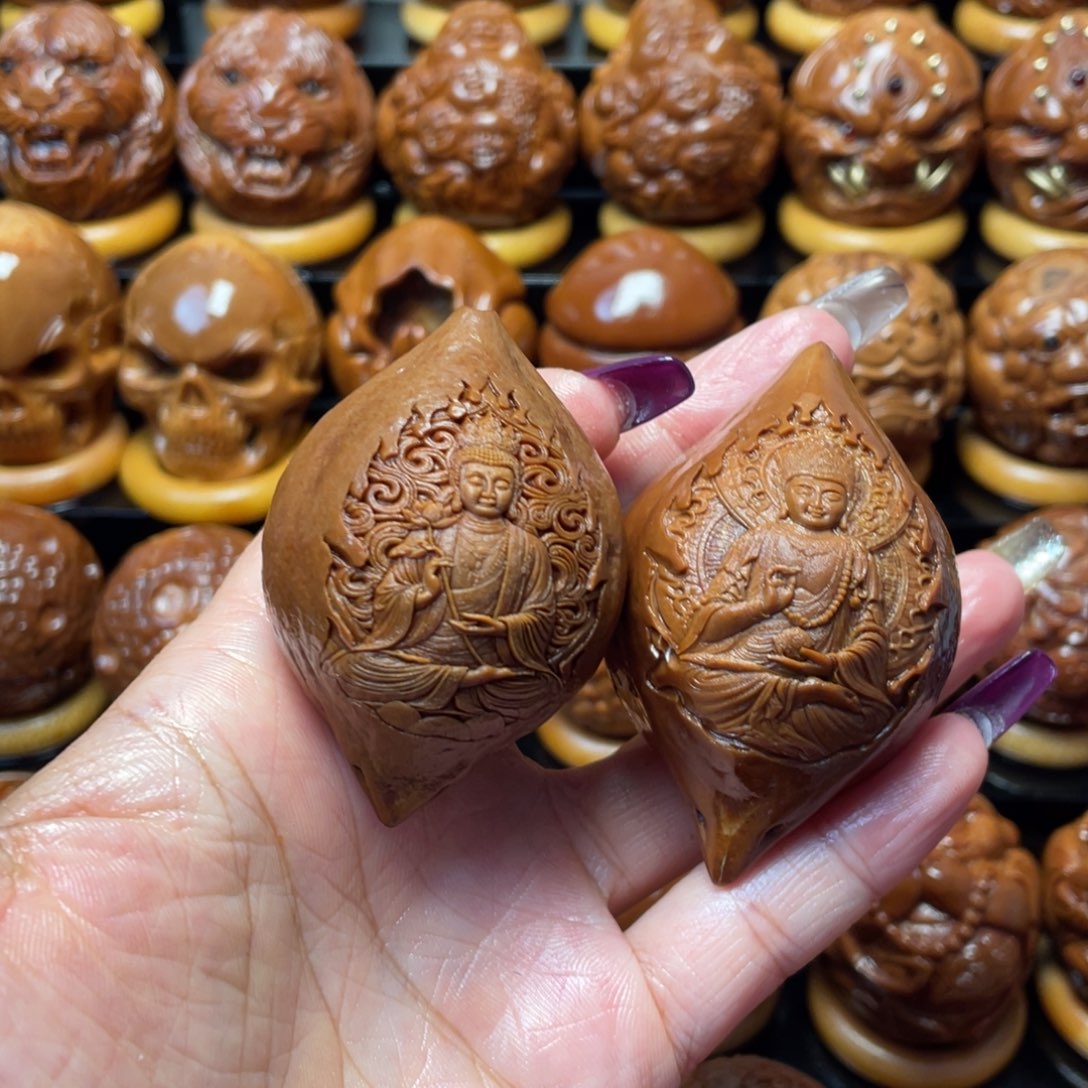 噜***.把件橄榄核橄榄球