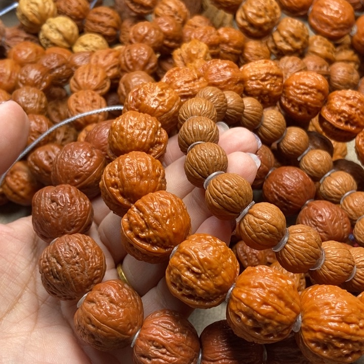 文玩核桃吊坠手持➕风羽猴头