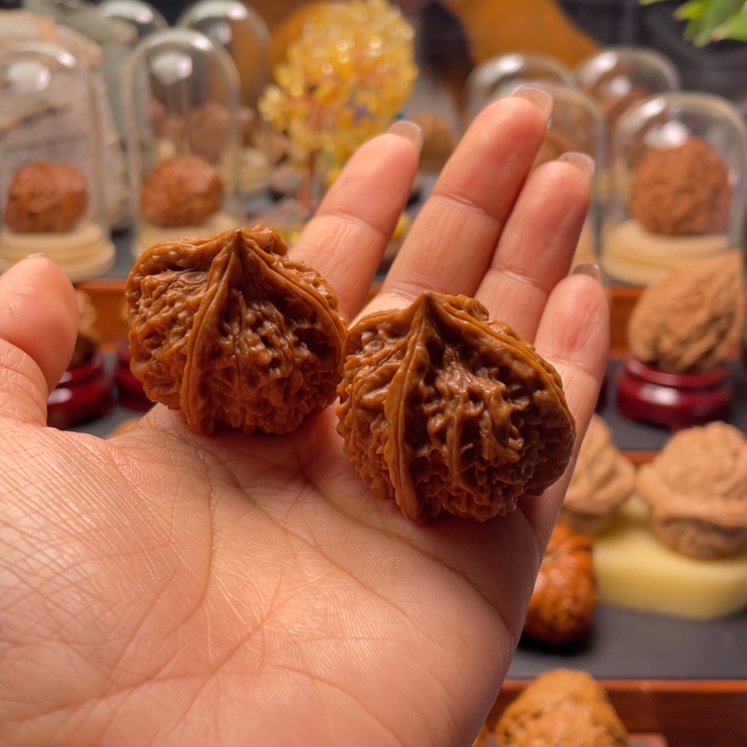 眯***儿文玩核桃把件四棱