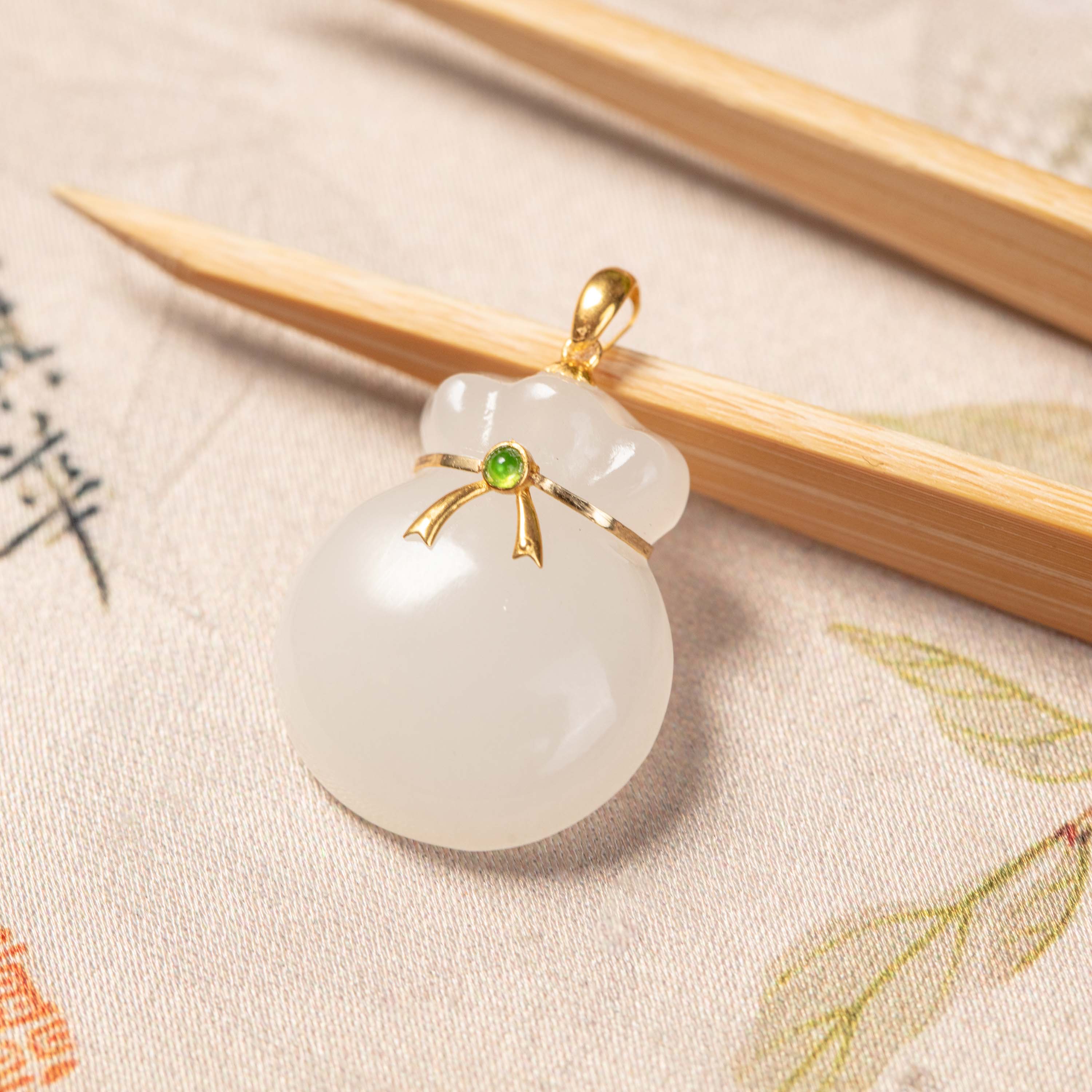 和田玉圆钱袋多样性发一约19*15*5mm#B1592051