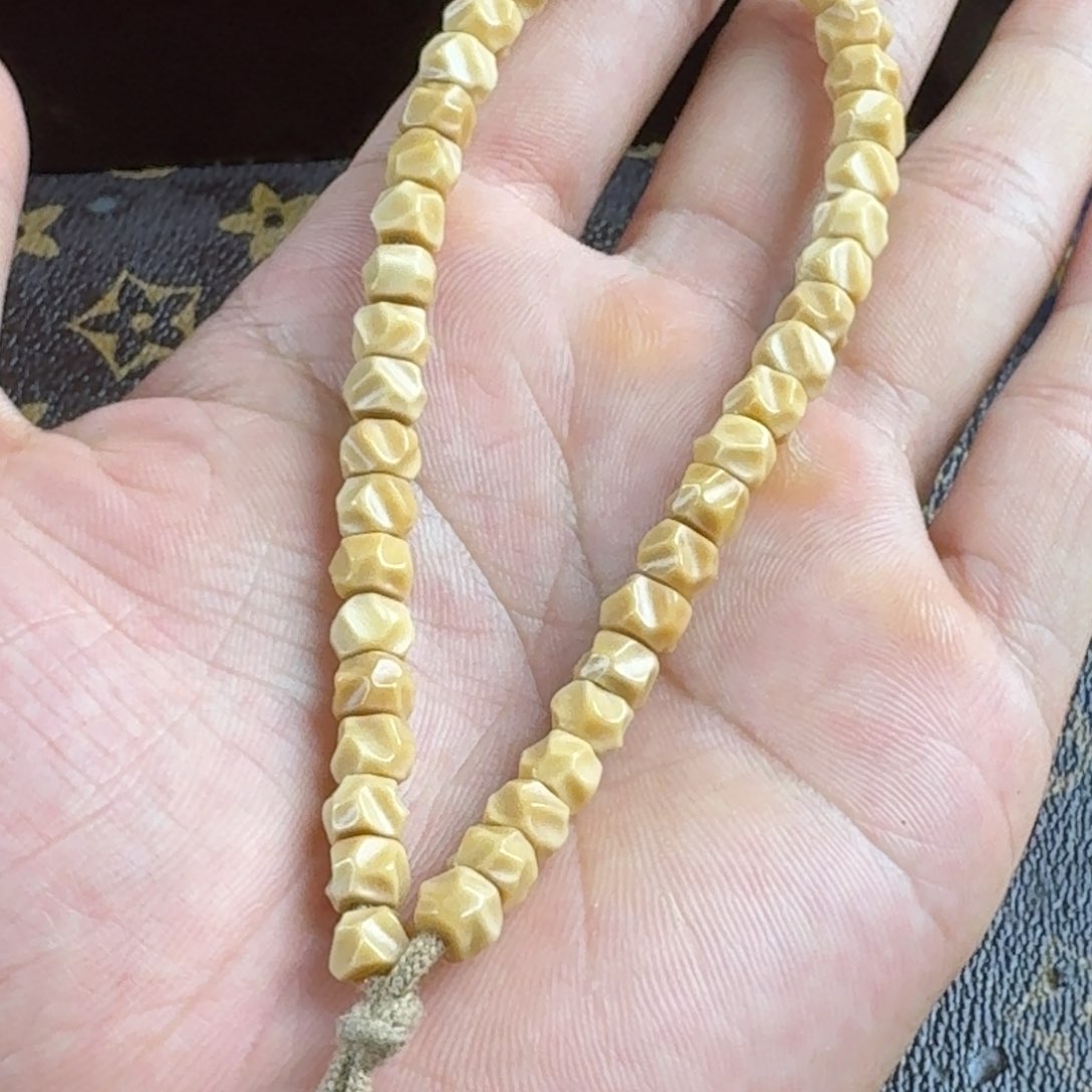 龙眼菩提吊坠手串