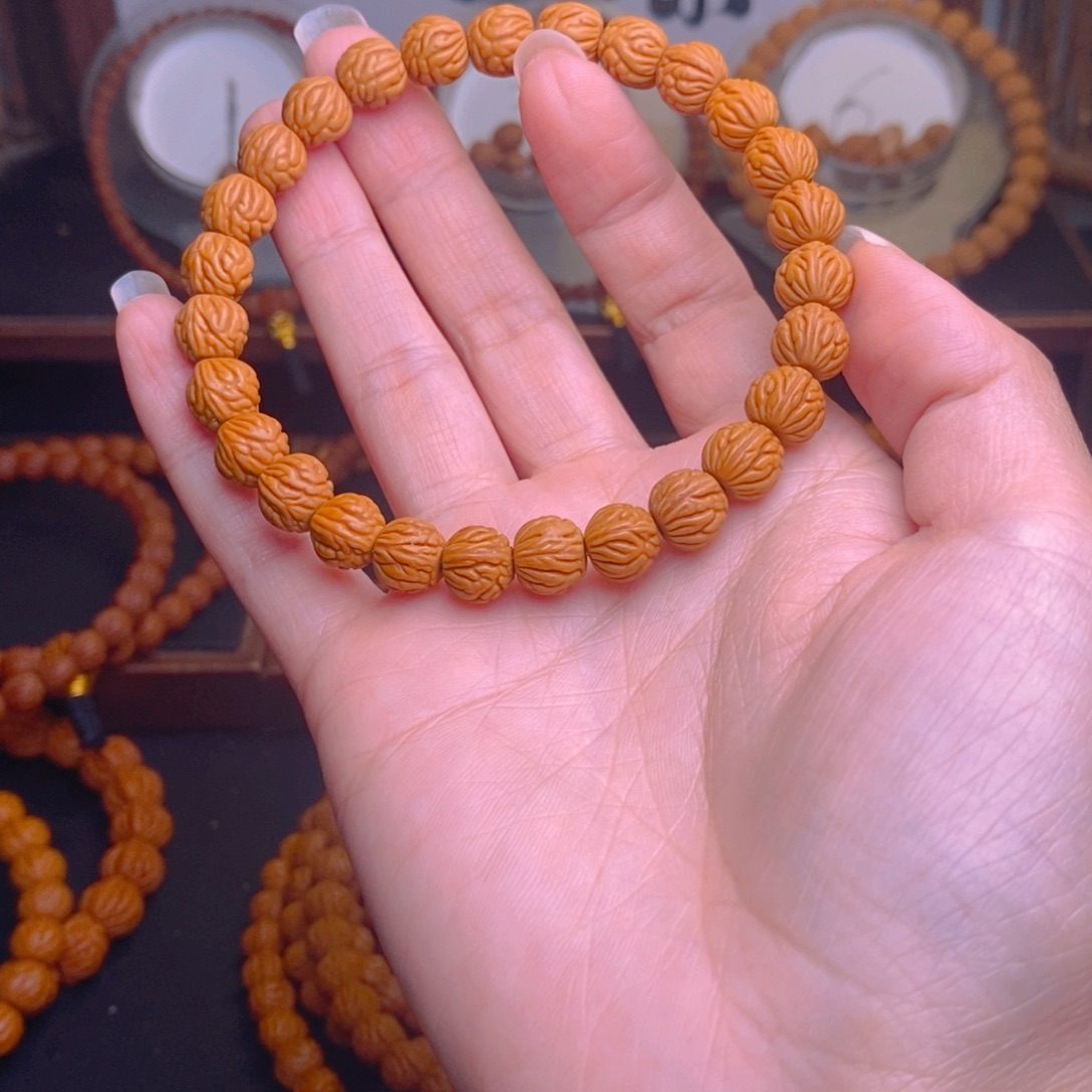 封***久桃核手串龙文桃核