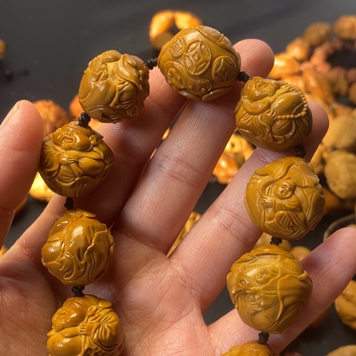 橄榄核手串在于我们