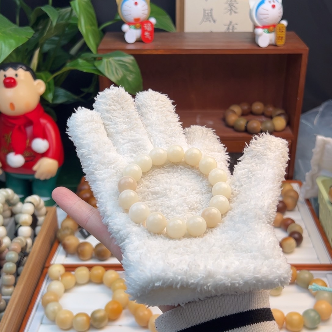 菩提根/象牙果手串青*微瑕卡13白圆珠