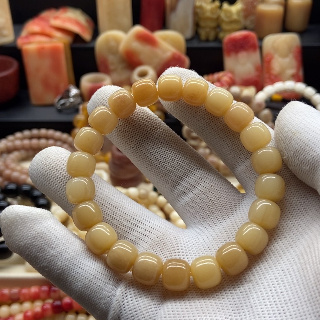 驼骨手串/手链喔*10毫米黄透
