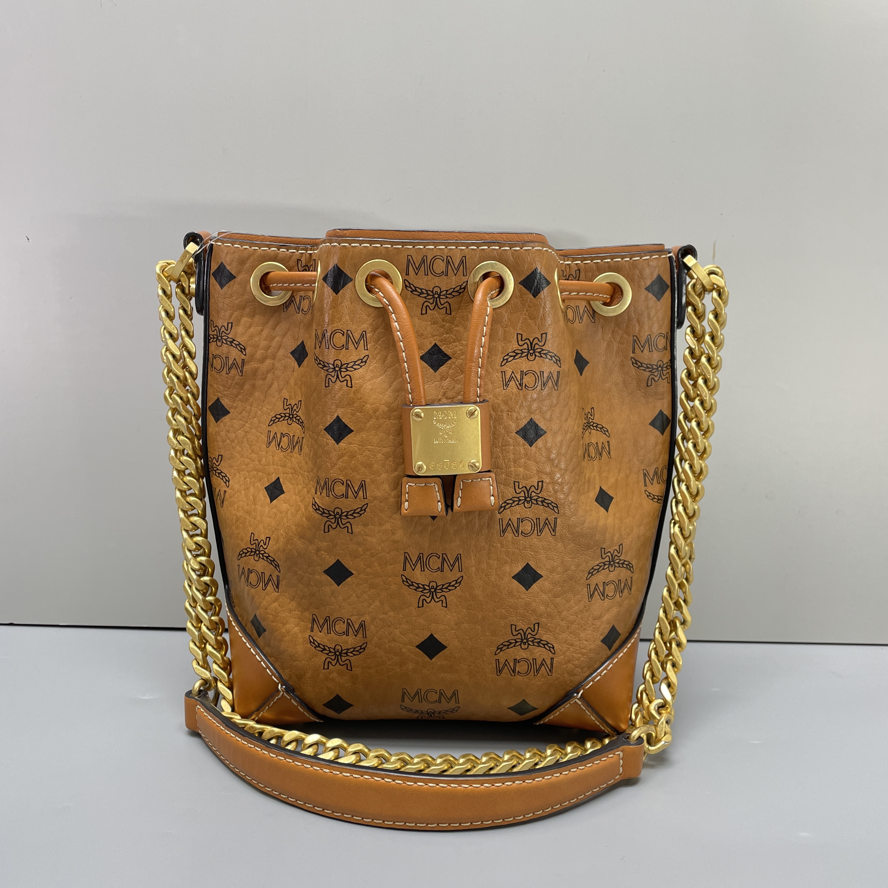 95新 MCM 媚姐/mcm干邑色抽绳小号水桶包16*20*11cmG080605