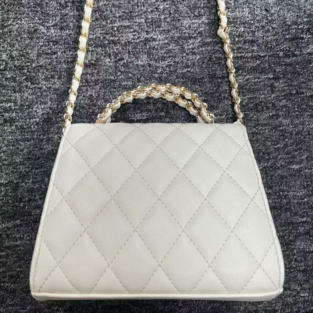 姝宴真皮女包双卷白色