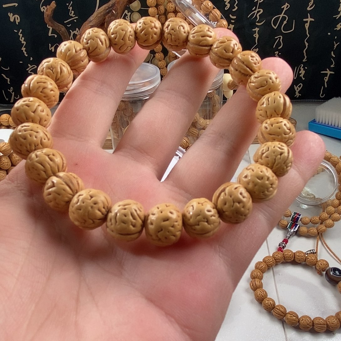 桃核吊坠13盘锦野生肌肉纹桃核手串