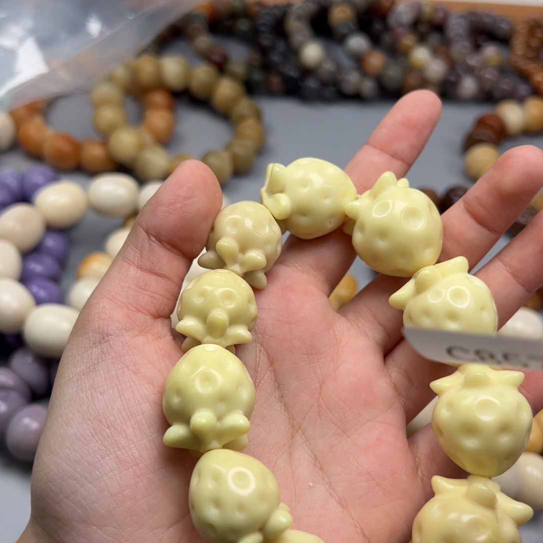 金***辰菩提根/象牙果吊坠C857草莓20-25瑕疵一串