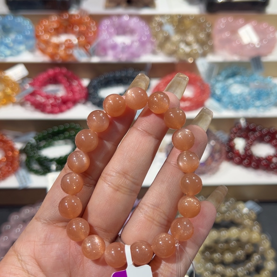 可****未镶嵌水晶手串天花板金沙橙月光10mm