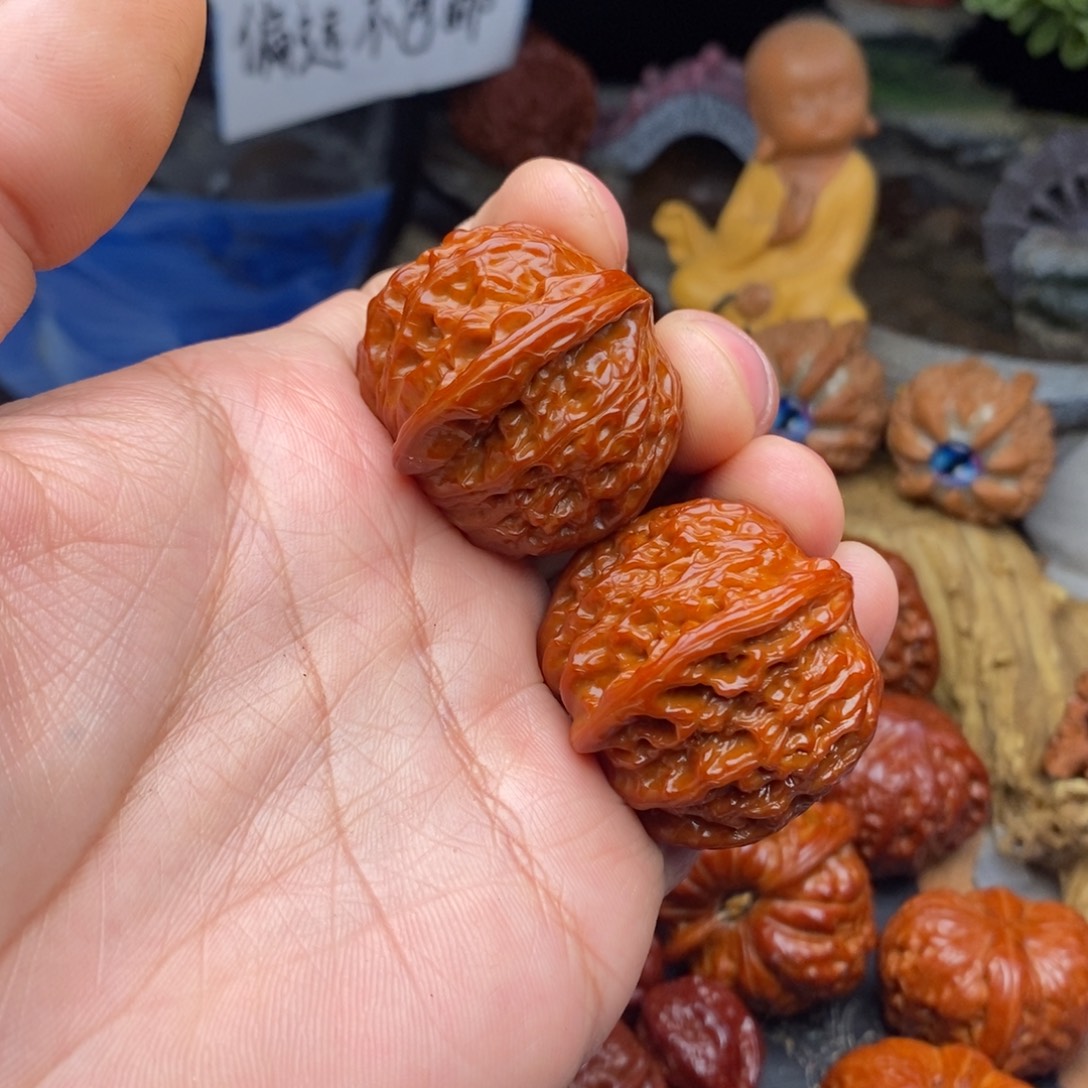 峰***啊文玩核桃把件磨盘