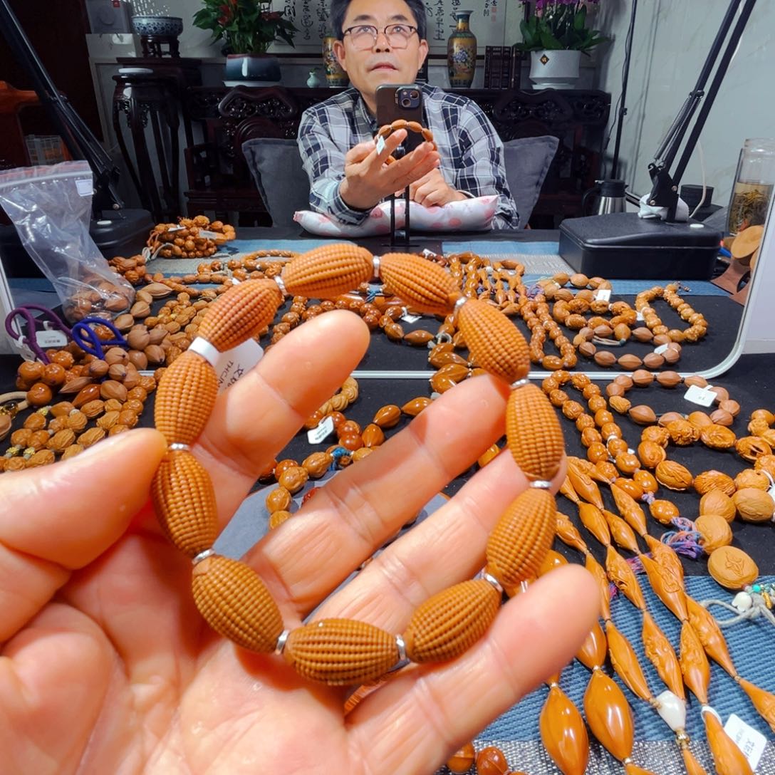 橄榄核吊坠新人在这里