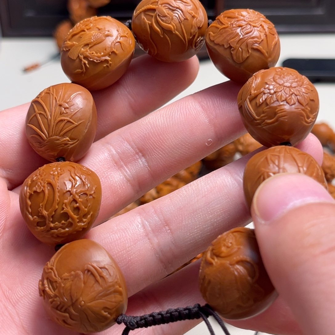 橄榄核吊坠研**造鸟语花香