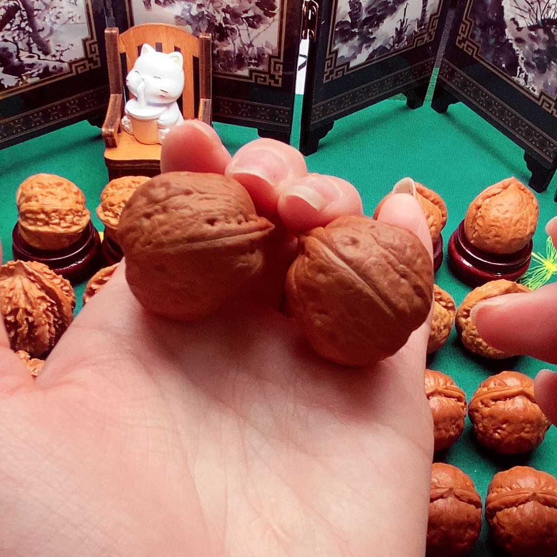 文玩核桃把件红皮佛肚