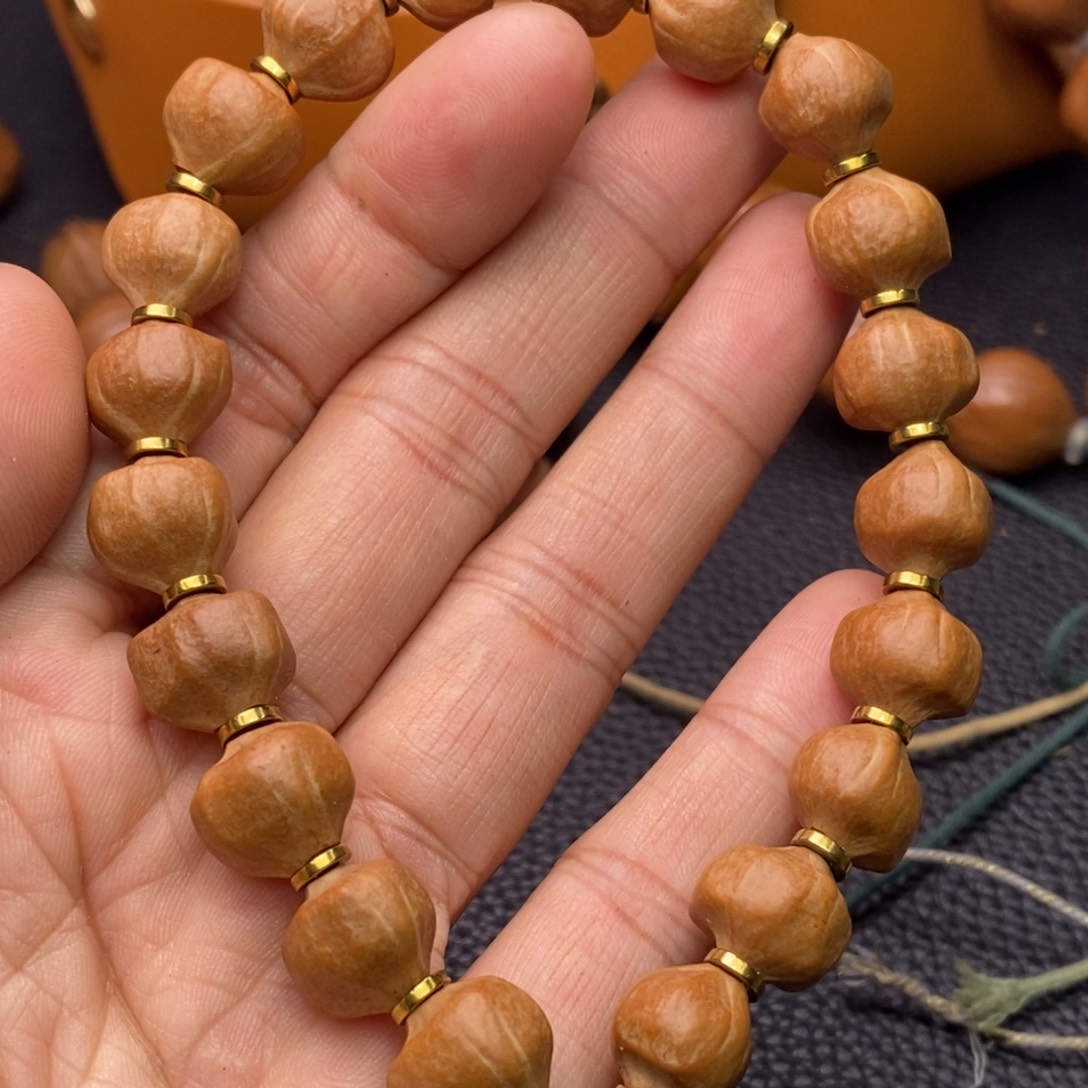 苹***。橄榄核手串/手链1