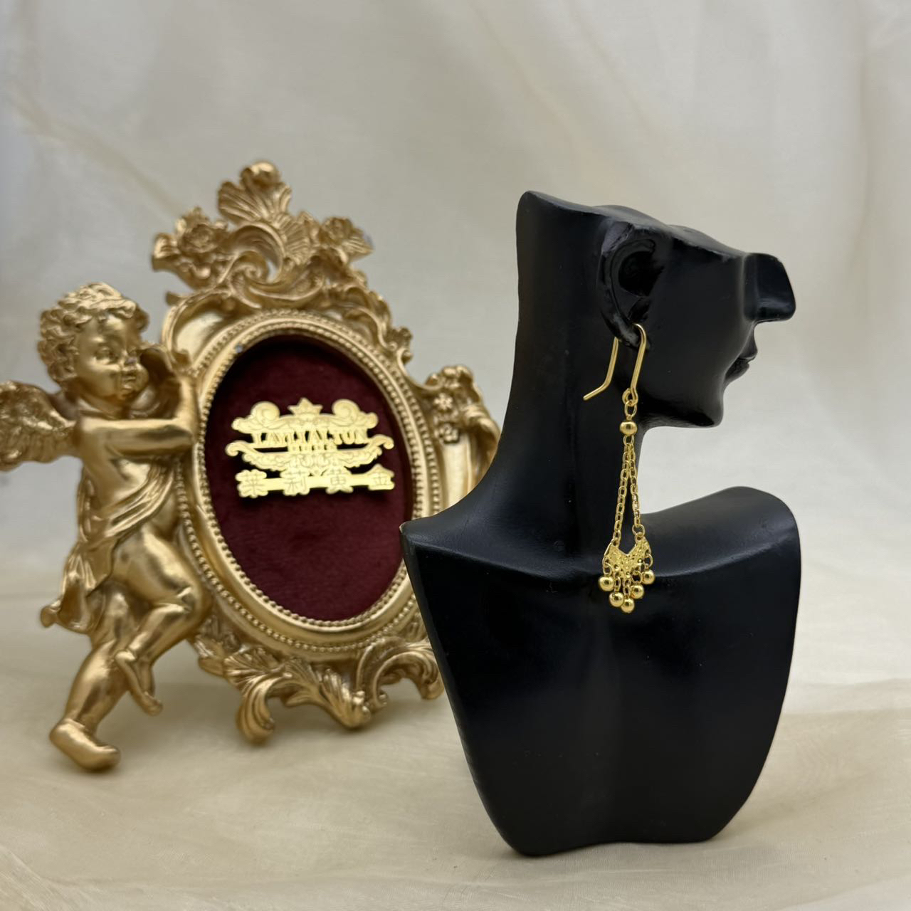 c播 4.51g 足金999 耳饰d