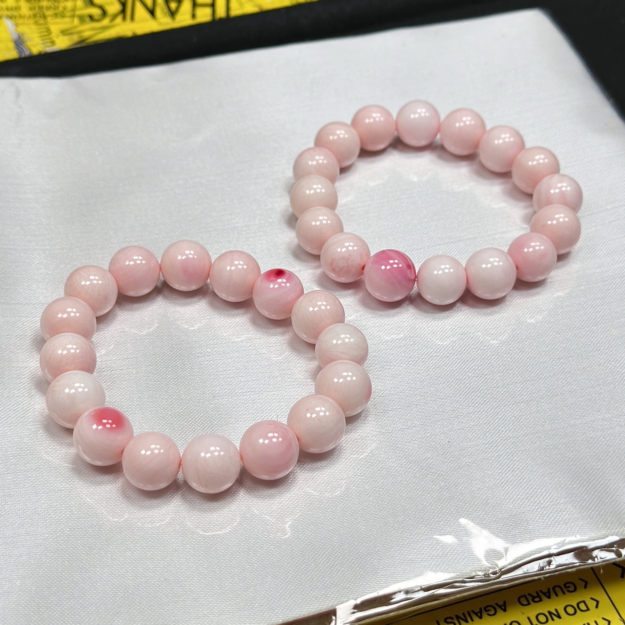 【AT】婴儿粉手串-约12mm（多样性发其一）