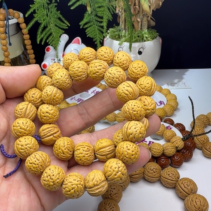 化***骨桃核吊坠文玩桃核手持