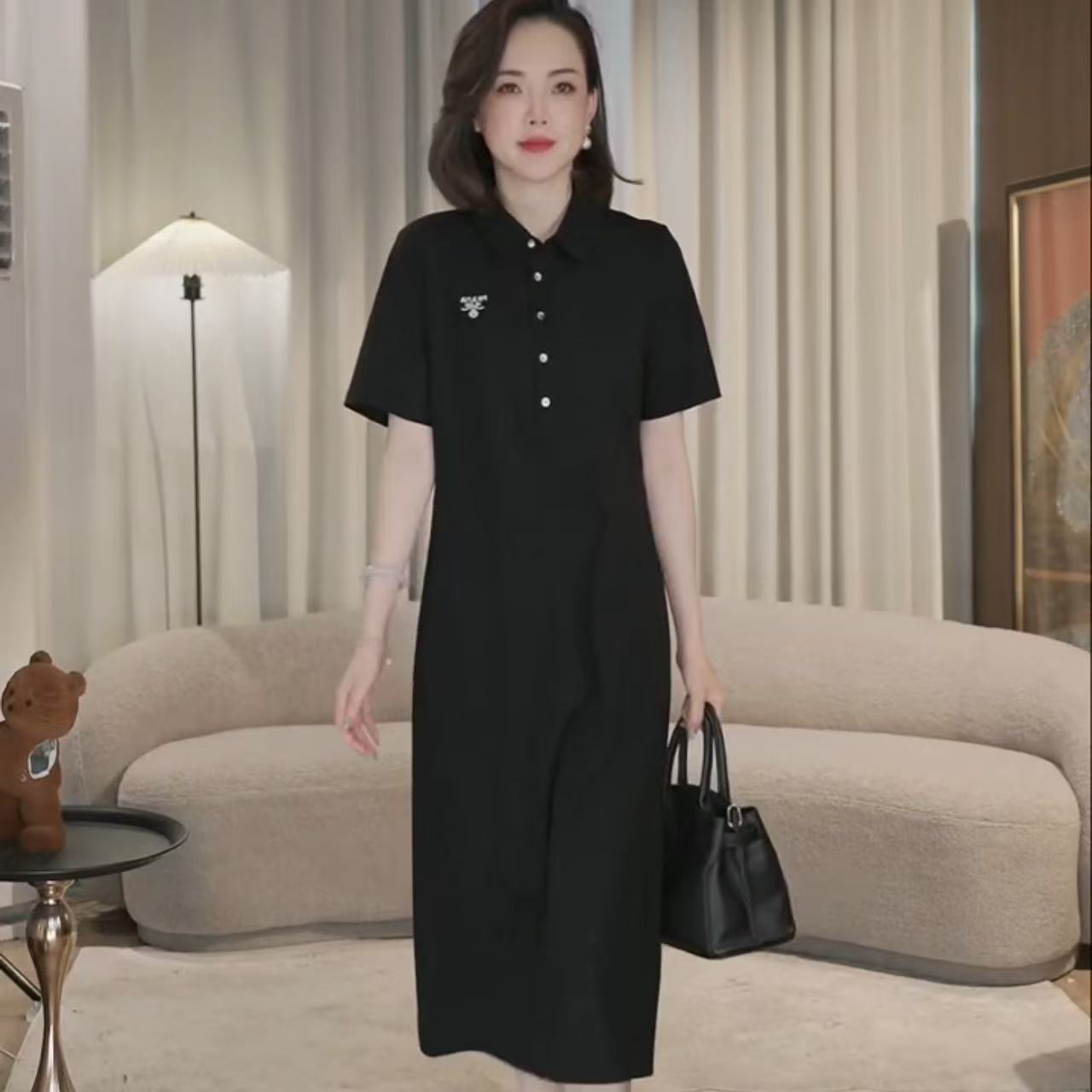 贝壳扣长款连衣裙