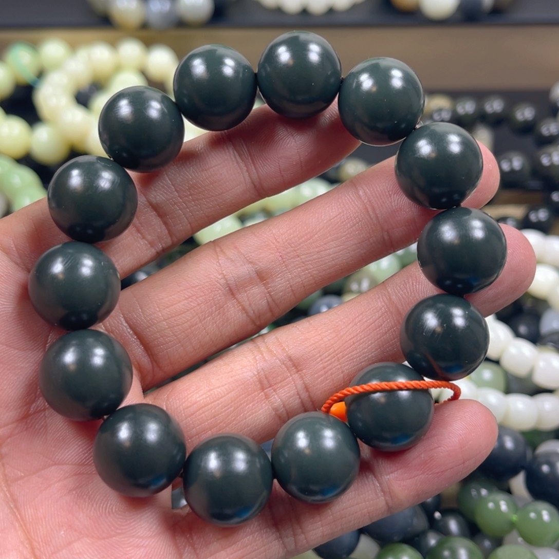 和田玉手串未镶嵌金*狼