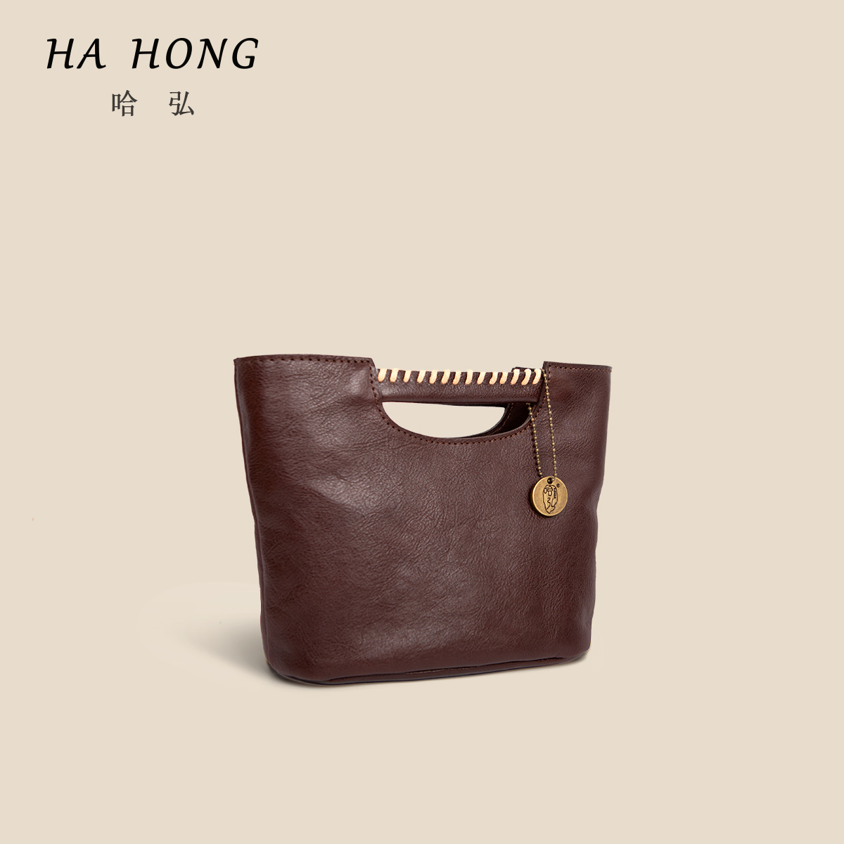 哈弘头层牛皮小众设计女款斜挎包2025复古简约小方包时尚包包