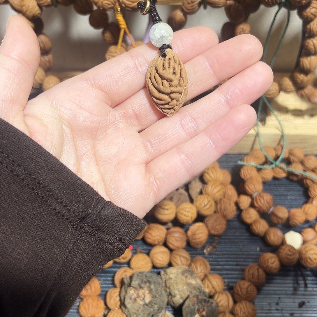 野生桃桃枭单籽吊坠