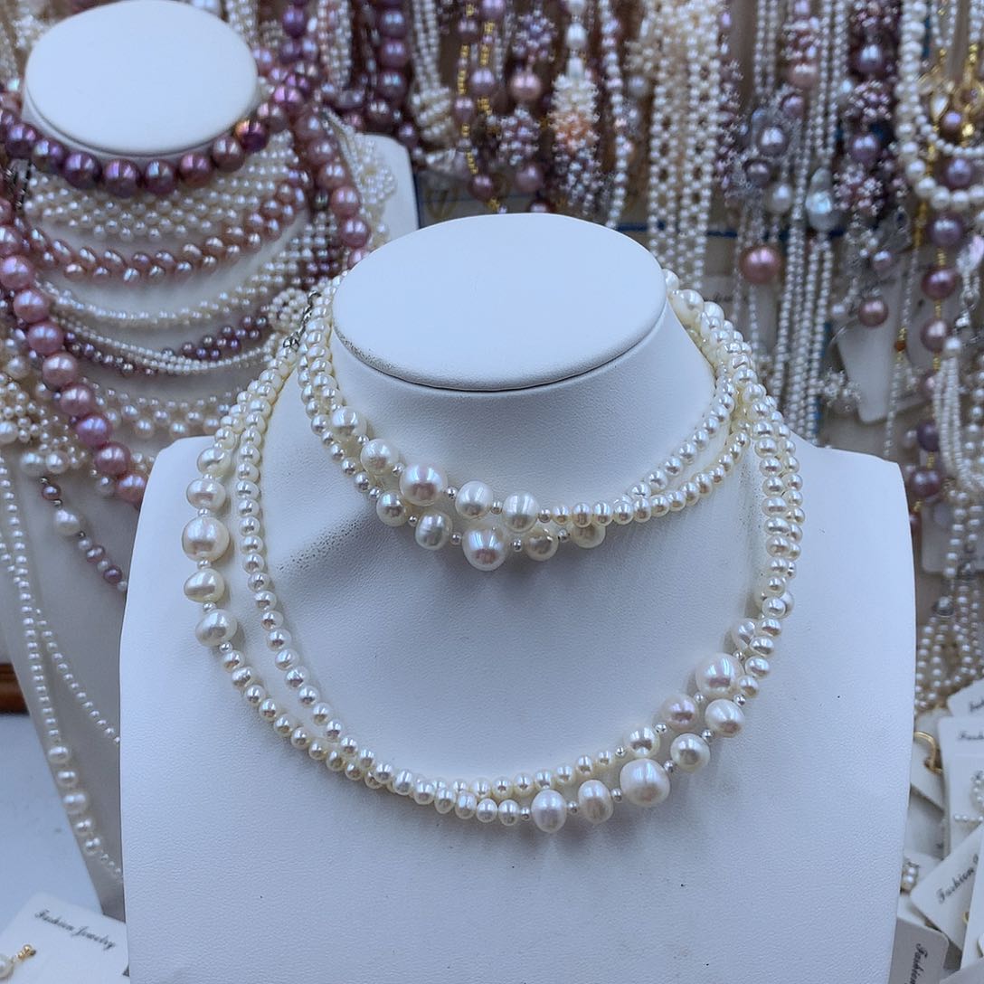 项链18K金镶嵌淡水珍珠波*?