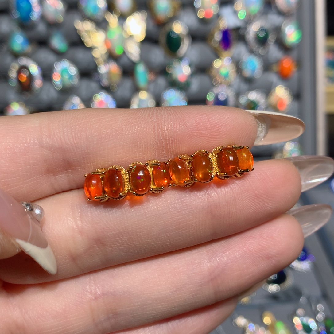 欧泊福利耳饰w银S925镶嵌不**心