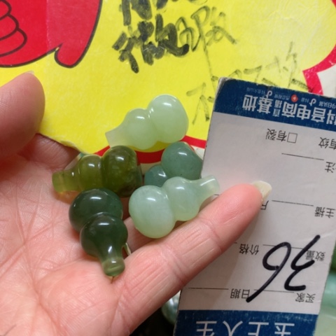 蛇纹石玉手把件未镶嵌