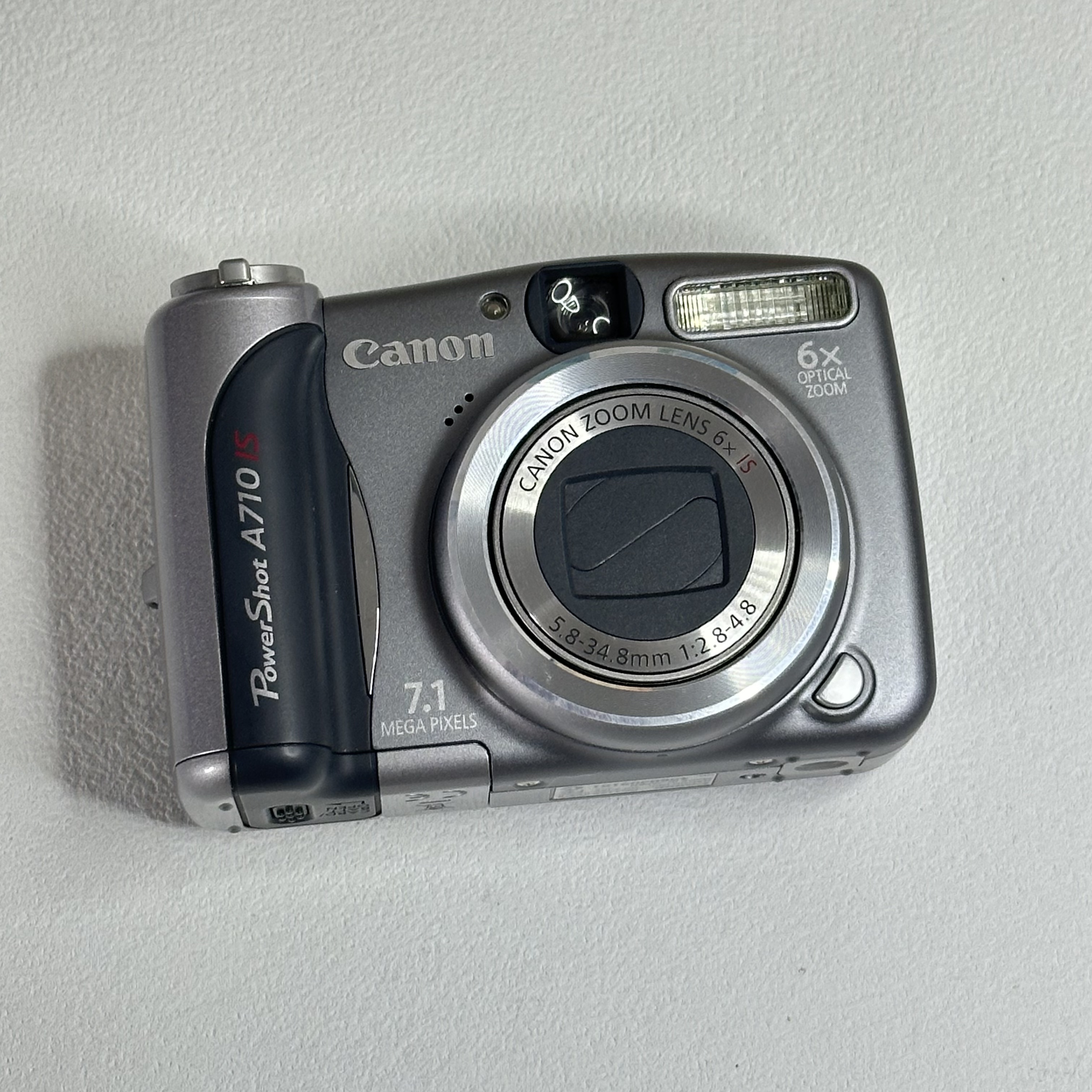 9新 Canon/佳能 A710 710w像素6倍光变 自备5号电池屏贴膜 冷白皮