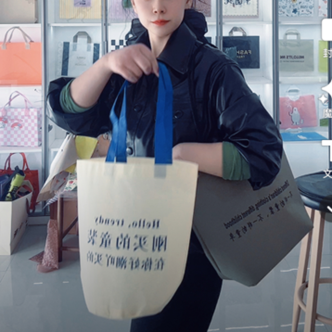 定制无纺布大容量服装水桶圆底手提袋服装店童装购物礼品印刷logo