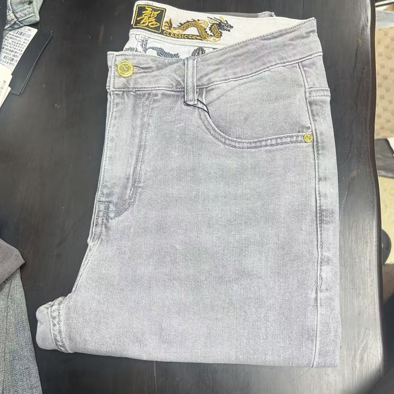 男士欧货牛仔裤四季款深蓝色修身小直筒