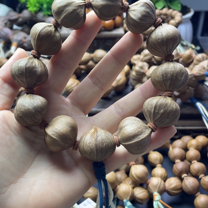 东***石橄榄核手串/手链广东铁四花24*24