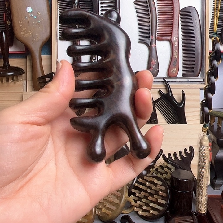 交趾黄檀（大红酸枝）乌木蜗牛按摩梳子