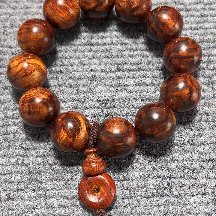 雨***君黄花梨手串文玩1件