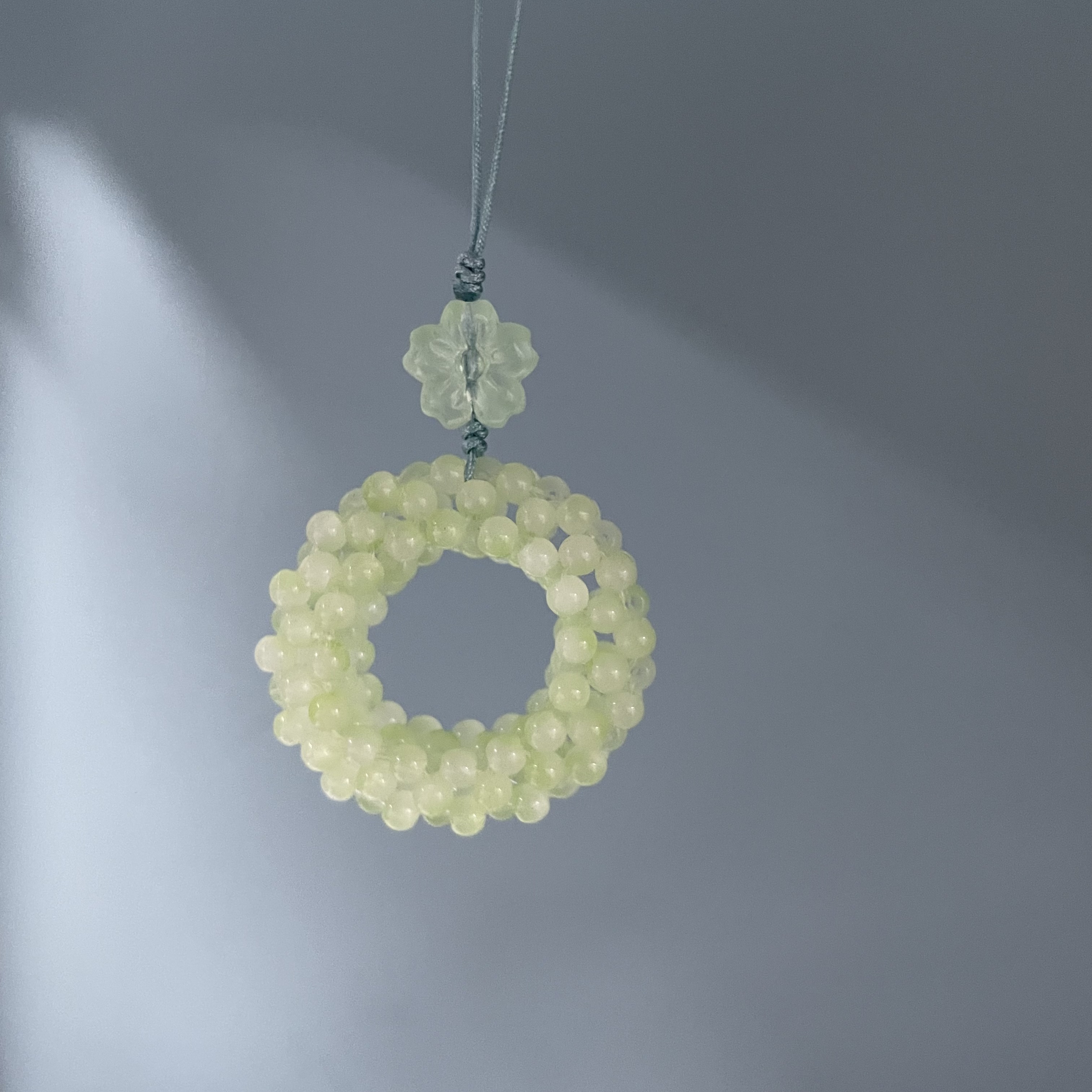 编织绳款淡绿甜甜圈手机坠E898